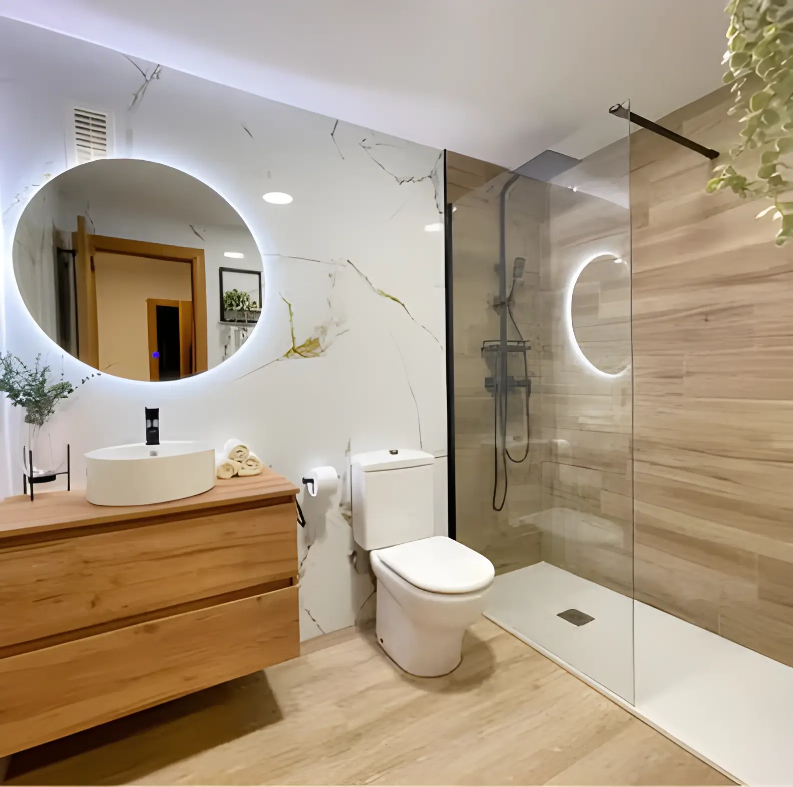 Baño reformado en Huesca con mampara y grifería nueva